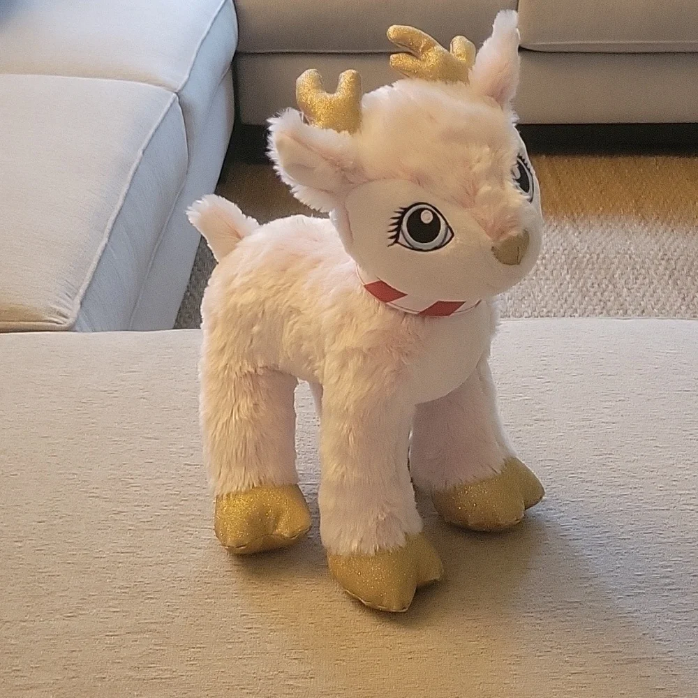 BAB Arctic pink baby reindeer with red & white striped collar. Build A Bear